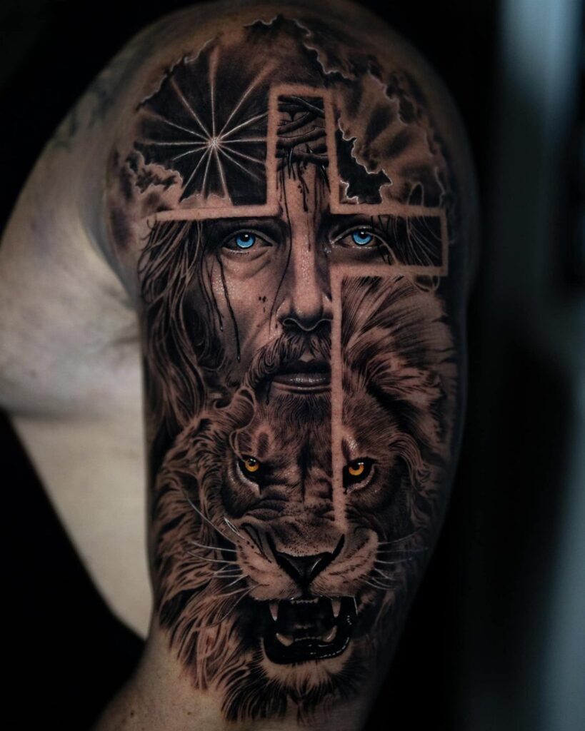 Detailed arm tattoo showing a split face of Jesus and a lion with a cross.