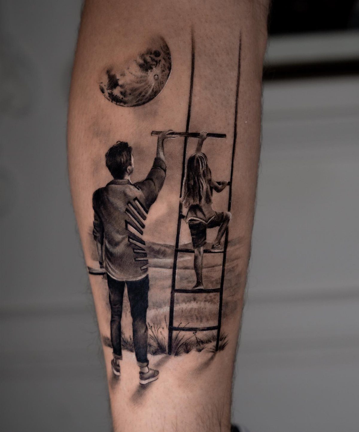 Black and grey tattoo of a father helping his daughter climb a ladder.
